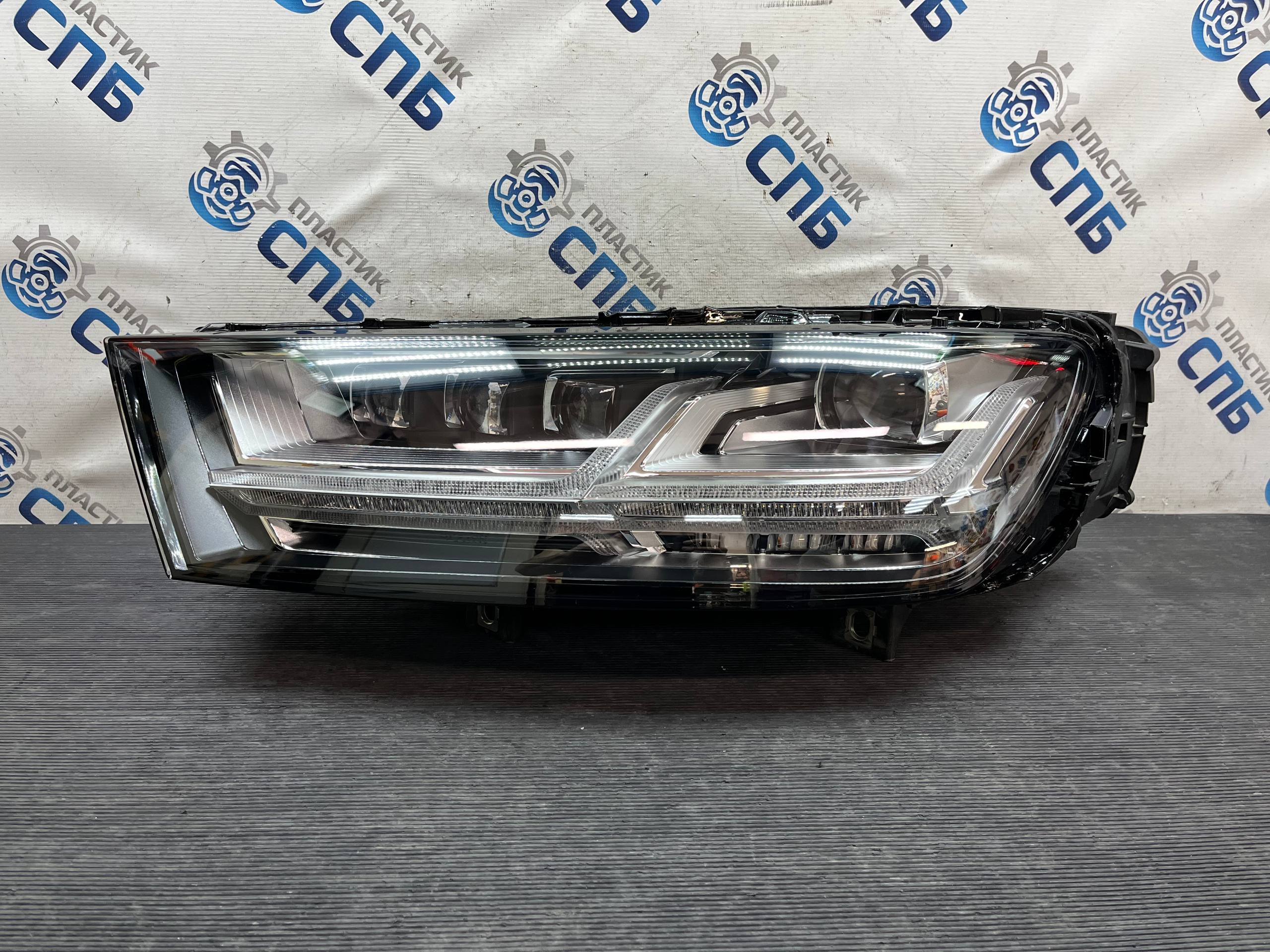 Замена стекла фары Audi Q7